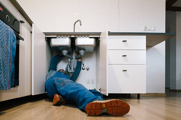 Professional Emergency Plumber technician working in Van Buren, AR